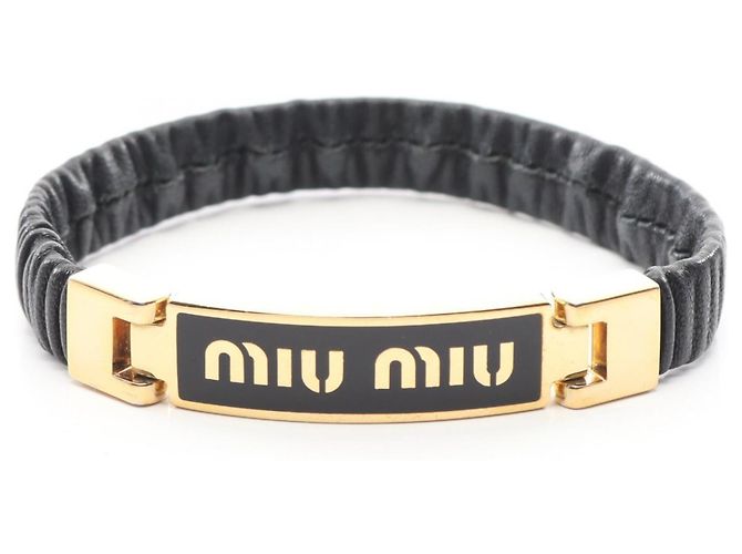 Bracciale in pelle e charm placcato oro Miu Miu Nero D'oro