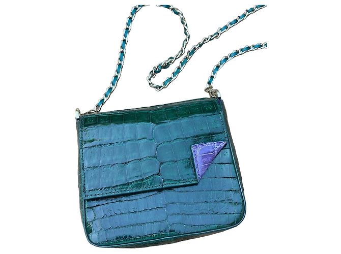 Bolsa de mão Mauboussin em couro de crocodilo verde Roxo