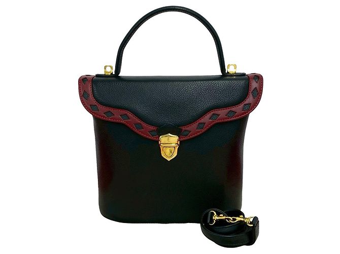 Autre Marque Saint Laurent Handtasche aus schwarzem Leder mit Diamond Cut Perforierung
