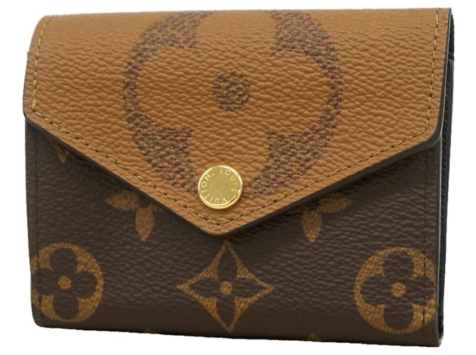 Cartera Louis Vuitton Tri-fold Castaño