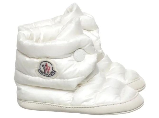 Botas para bebé Moncler em pele e penugem - Creme