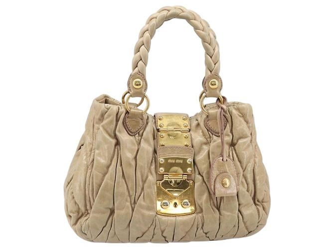 Sac Convertible Coffer Miu Miu en Cuir Matelassé Medium Beige