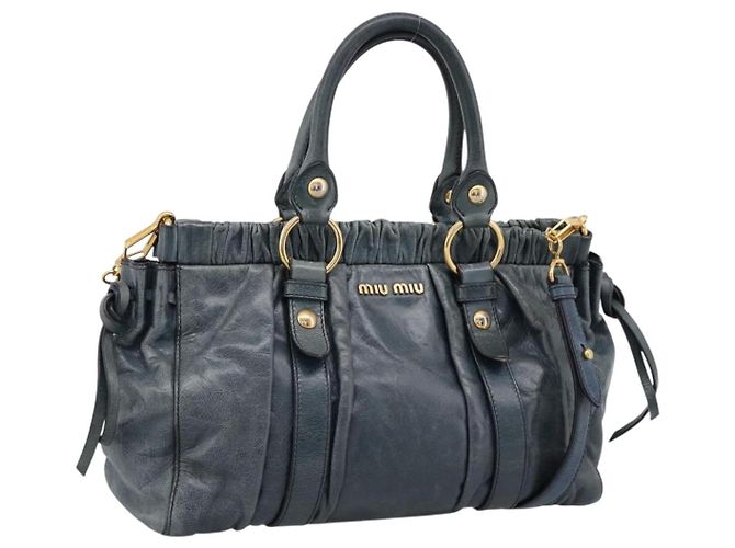 Bolsa Miu Miu em couro 2way azul tom dourado Auth 167595M