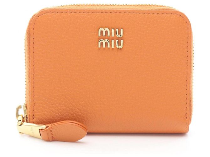 Monedero de piel naranja Miu Miu