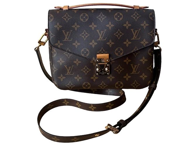 Louis Vuitton Metis Leather Handbag