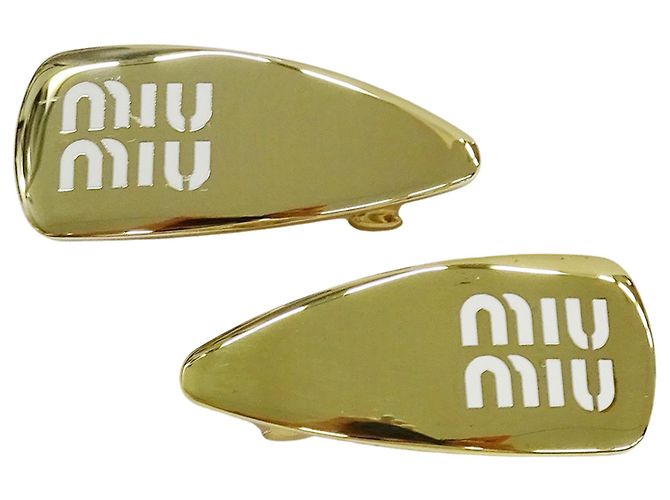 Fermi capelli dorati Miu Miu D'oro