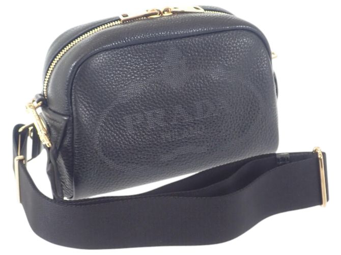 Sac Camera Prada en cuir Vitello Daino perforé noir avec logo