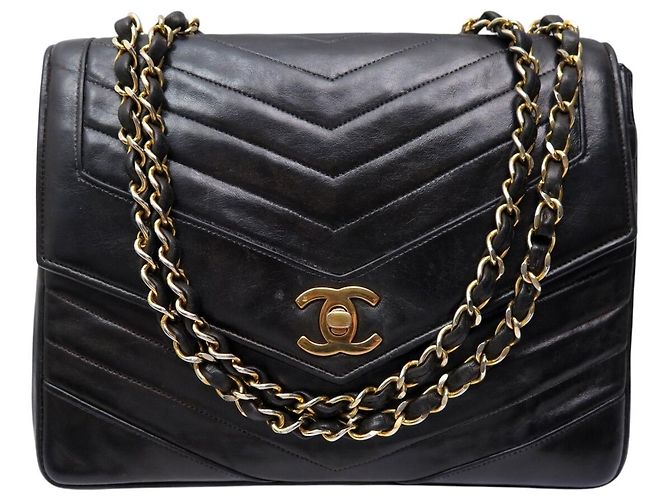 VINTAGE CHANEL CLASSIQUE TIMELESS HANDTASCHE AUS SCHWAREM CHEVRON-LEDER Schwarz
