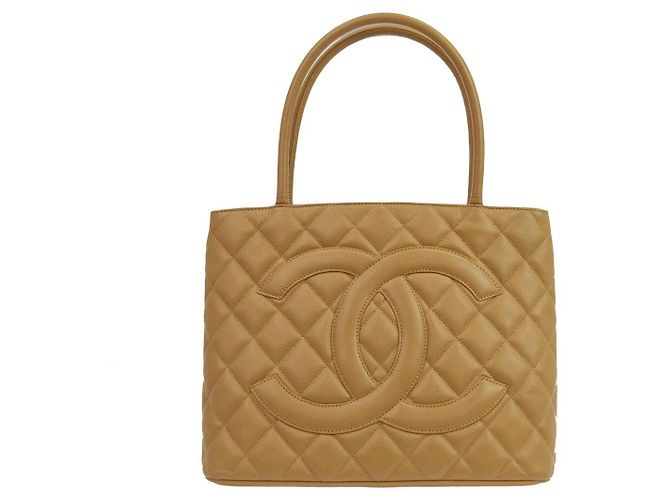 Chanel Medallion Quilted Caviar Bege