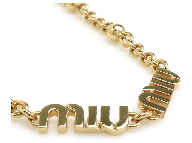 Collar de metal dorado Miu Miu