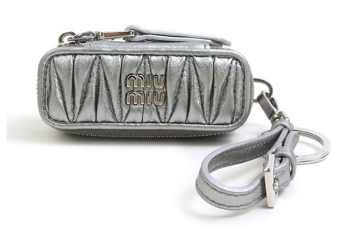 Charm per borsa Miu Miu in pelle argento
