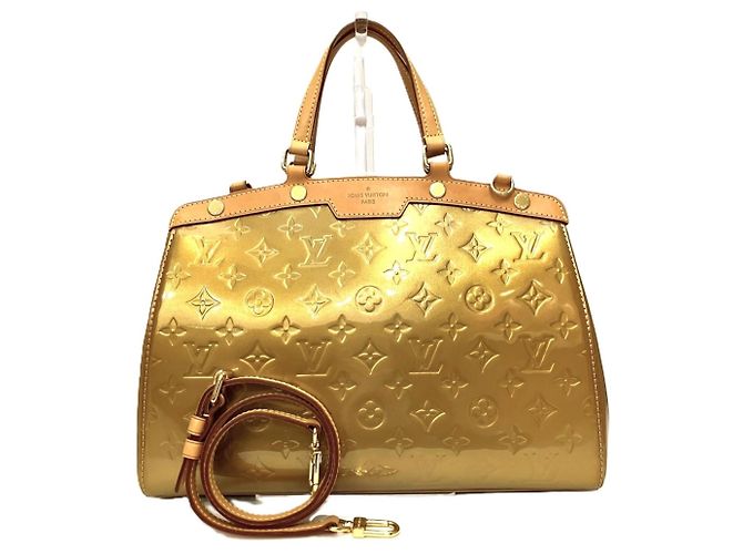 Sac à main Louis Vuitton Blair MM Doré