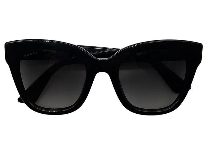 Occhiali da sole Gucci con montatura a farfalla nera e logo GG Nero