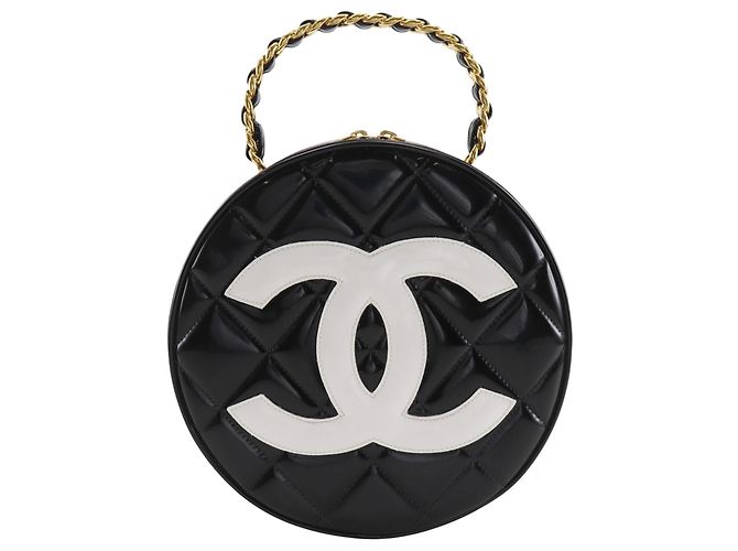 Bolso Vanity redondo de charol acolchado negro Chanel CC