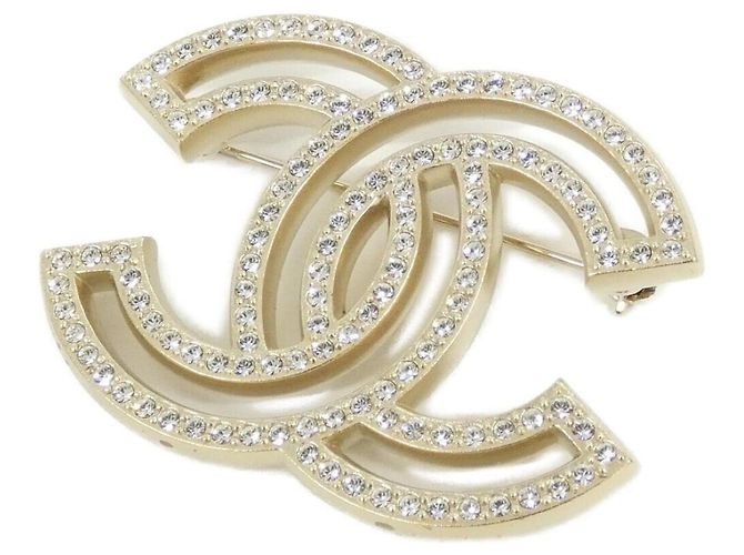 Broche Chanel Clear and Gold Dorado