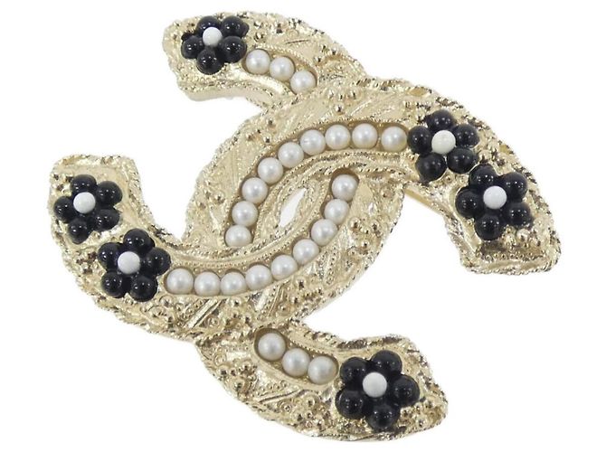 Broche Chanel AB5966 Negro Blanco Dorado
