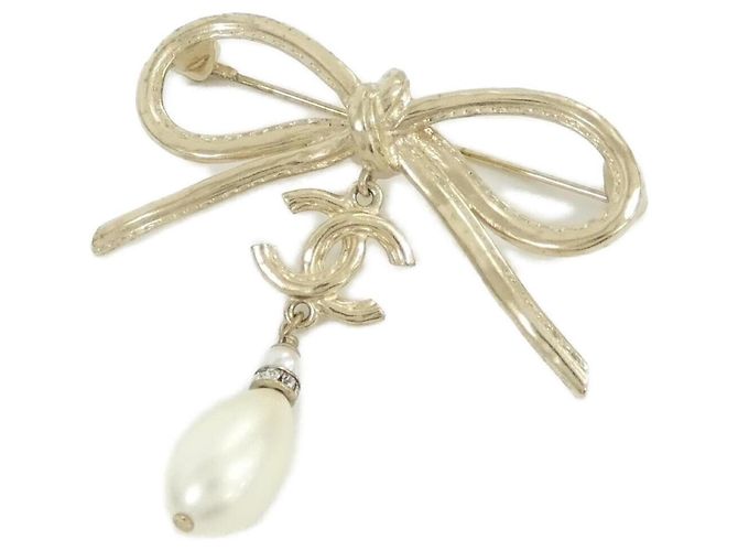Broche Chanel AB8392 Dorado y Blanco