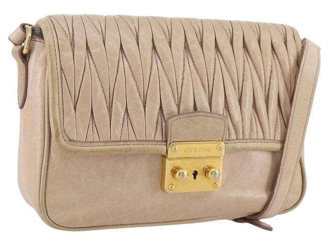 Bolsa de Ombro Miu Miu Matelassé em Couro Rosa Tom Dourado Auth 205812A