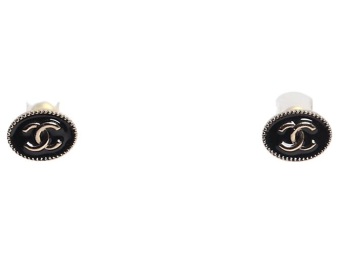 Chanel Black and gold CC oval stud earrings
