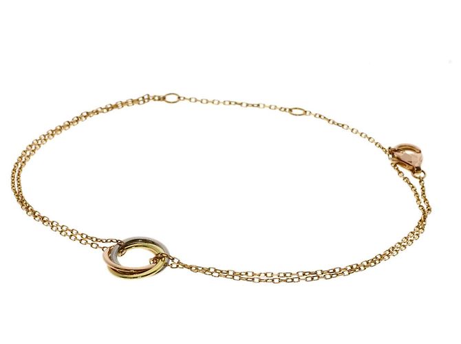 Pulseira Cartier Trinity com pingente em ouro 18K