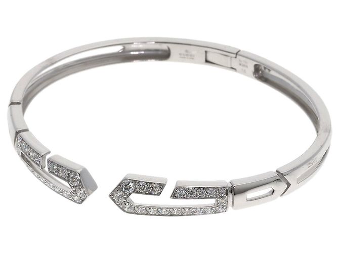 Pulsera de dijes Gucci en oro blanco de 18K