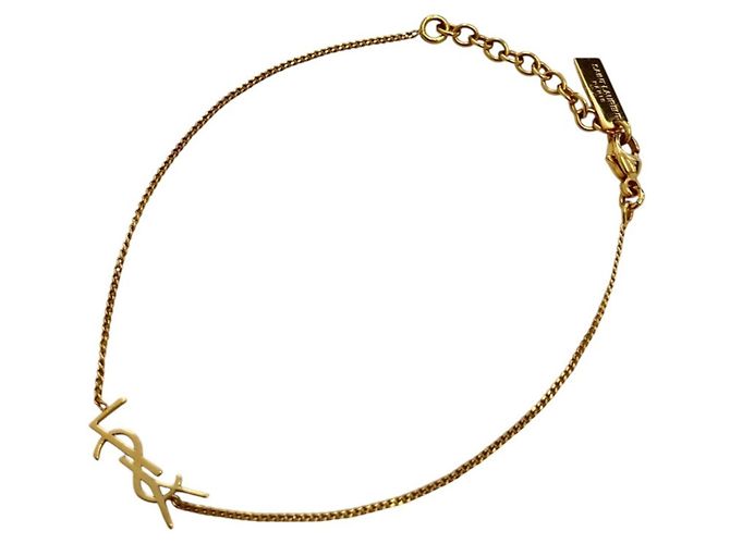 Pulseira com pingentes dourada Yves Saint Laurent Dourado