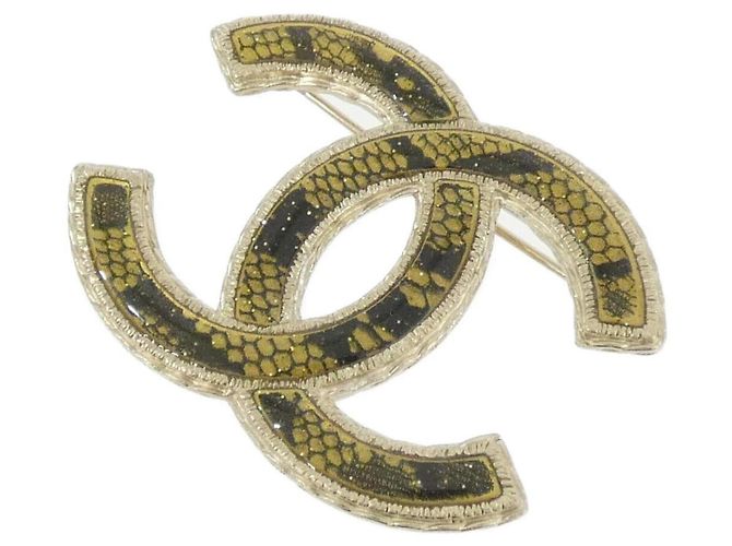 Chanel Brosche in Schwarz und Gold Golden