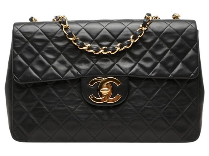 Borsa a tracolla con catena Chanel Coco Mark Matelassé Nero