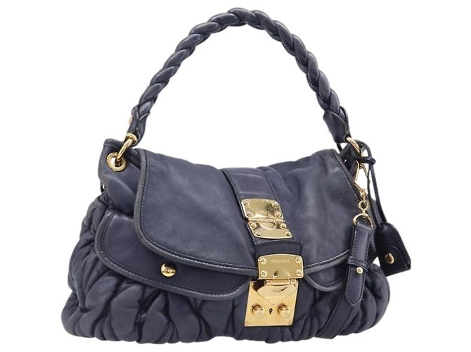 Bolsa de mão Miu Miu Matelassé em couro 2way Navy tom dourado Auth 167624V