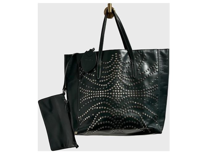 Borsa tote Alaïa in pelle verde con borchie metalliche