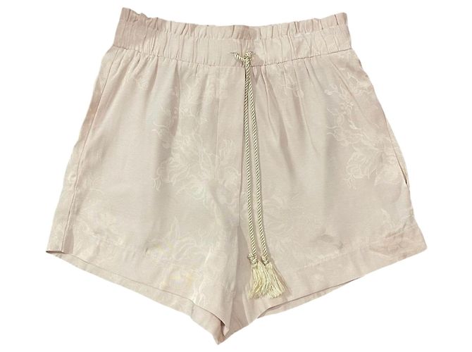 Short Nanushka beige T.S