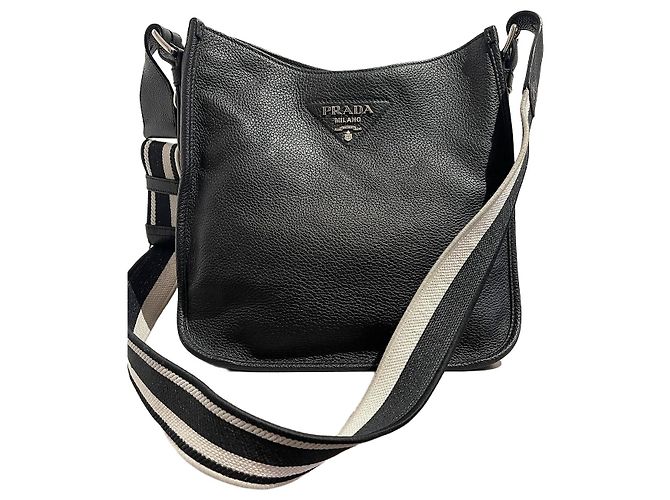 Bolso de mano Prada de piel granulada negra con correa de tela Negro