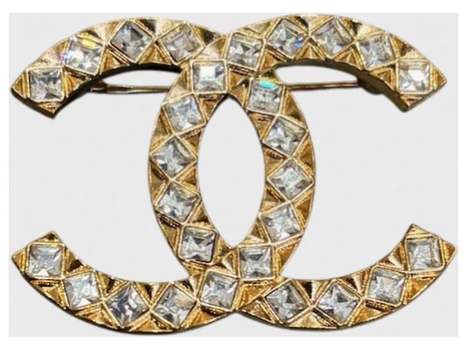 Broche Chanel CC dorée