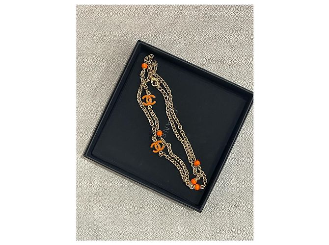 Collana lunga Chanel arancione D'oro