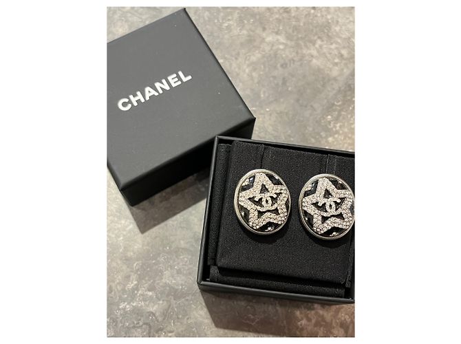 Chanel Sternen-Ohrringe NEU Silber