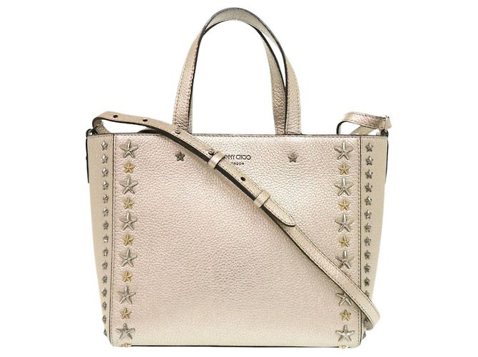 Bolsa de mão Jimmy Choo Pegassi em couro dourado com tachas de estrela