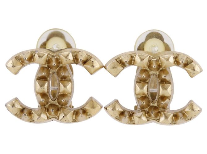 Brincos de clip Chanel Coco Mark