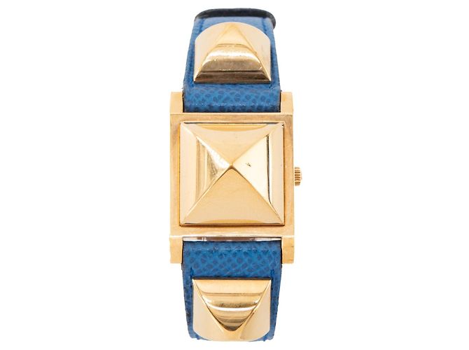 HERMÈS - Relógio Médor PM Hermès em couro grão azul e banhado a ouro
