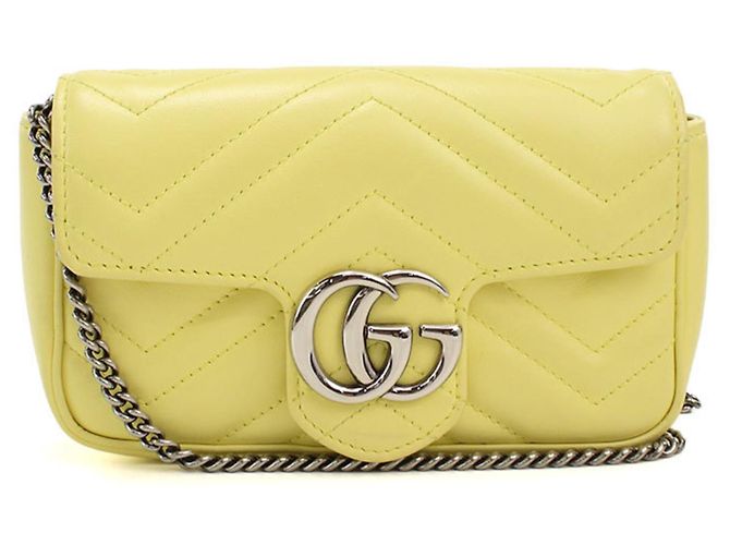 Bolsa de Ombro Gucci Mini GG Marmont acolchoada Amarelo