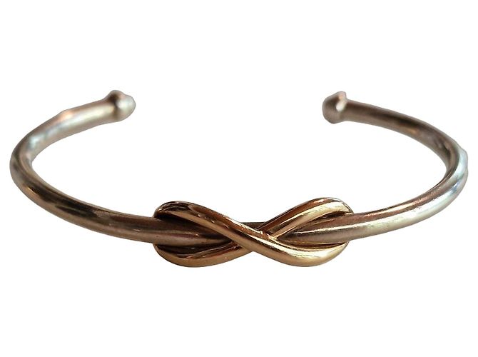 Bracciale rigido Tiffany & Co. Infinity in argento sterling e oro giallo 18K D'oro