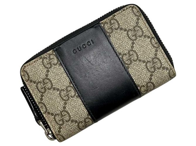 Portamonete Gucci in beige e nero