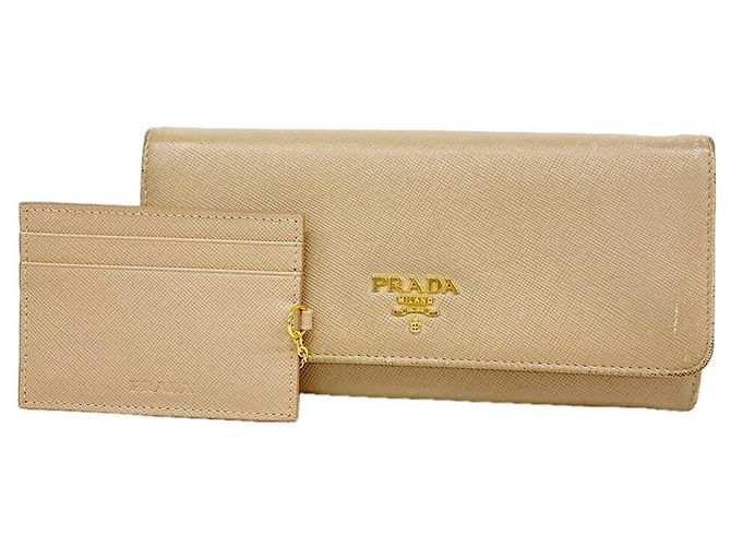 Cartera larga Prada de piel beige