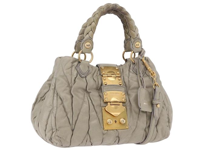 Bolsa de Mão Miu Miu Matelassé em Couro 2way Bege Tom Dourado Auth 167625V