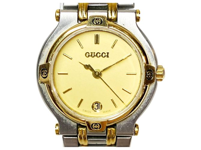 Reloj de pulsera Gucci de acero inoxidable con esfera dorada