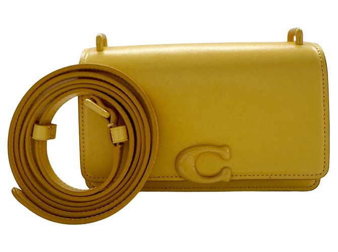 Bolsa de ombro Coach em couro amarelo
