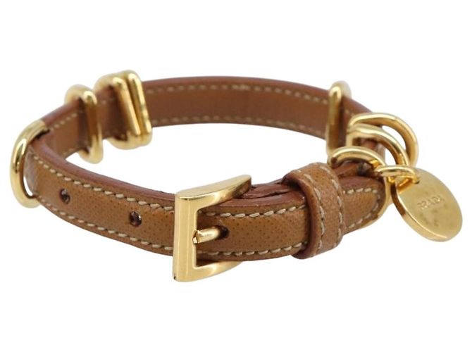 Pulseira PRADA em couro marrom tom dourado Auth ar14250V