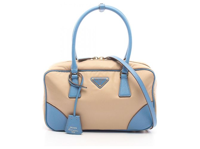 Prada RE-EDITION 1978 RE-NYLON Sac à main moyen à doubles anses Bleu Beige