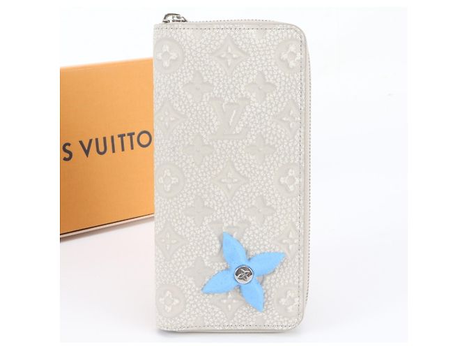 Cartera Zippy Louis Vuitton RFID Taurillon Climbing Blanco
