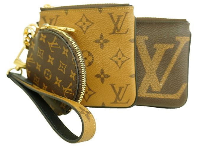 Borsa Louis Vuitton Monogram Giant Reverse Pochette Trio Marrone