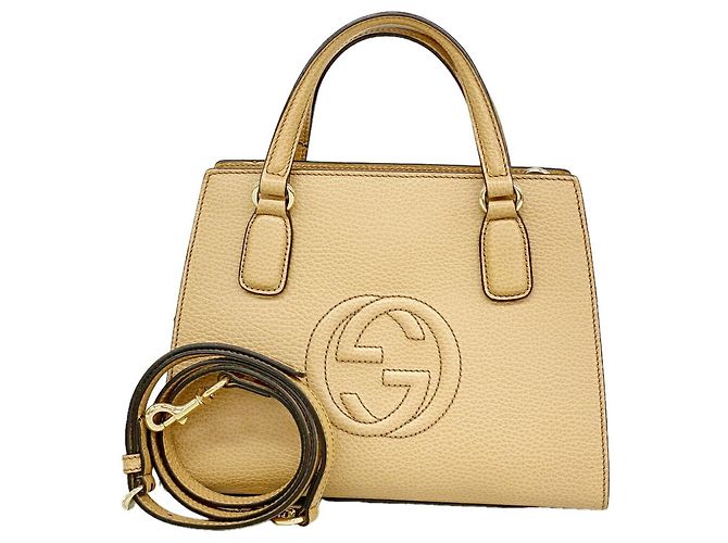 Bolsa Gucci Soho de couro bege
